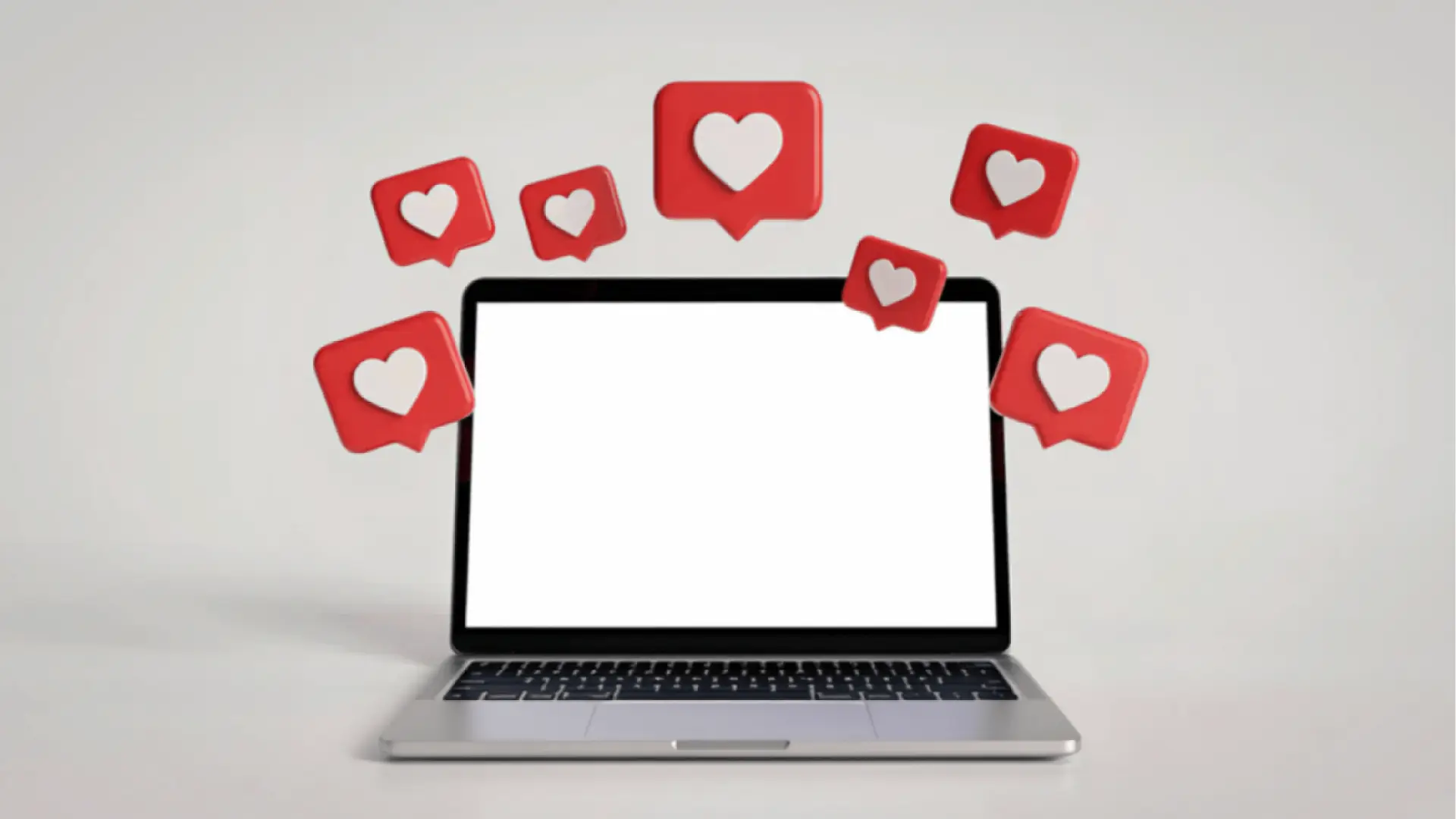 Open laptop with blank screen and floating red heart notification icons for brand management