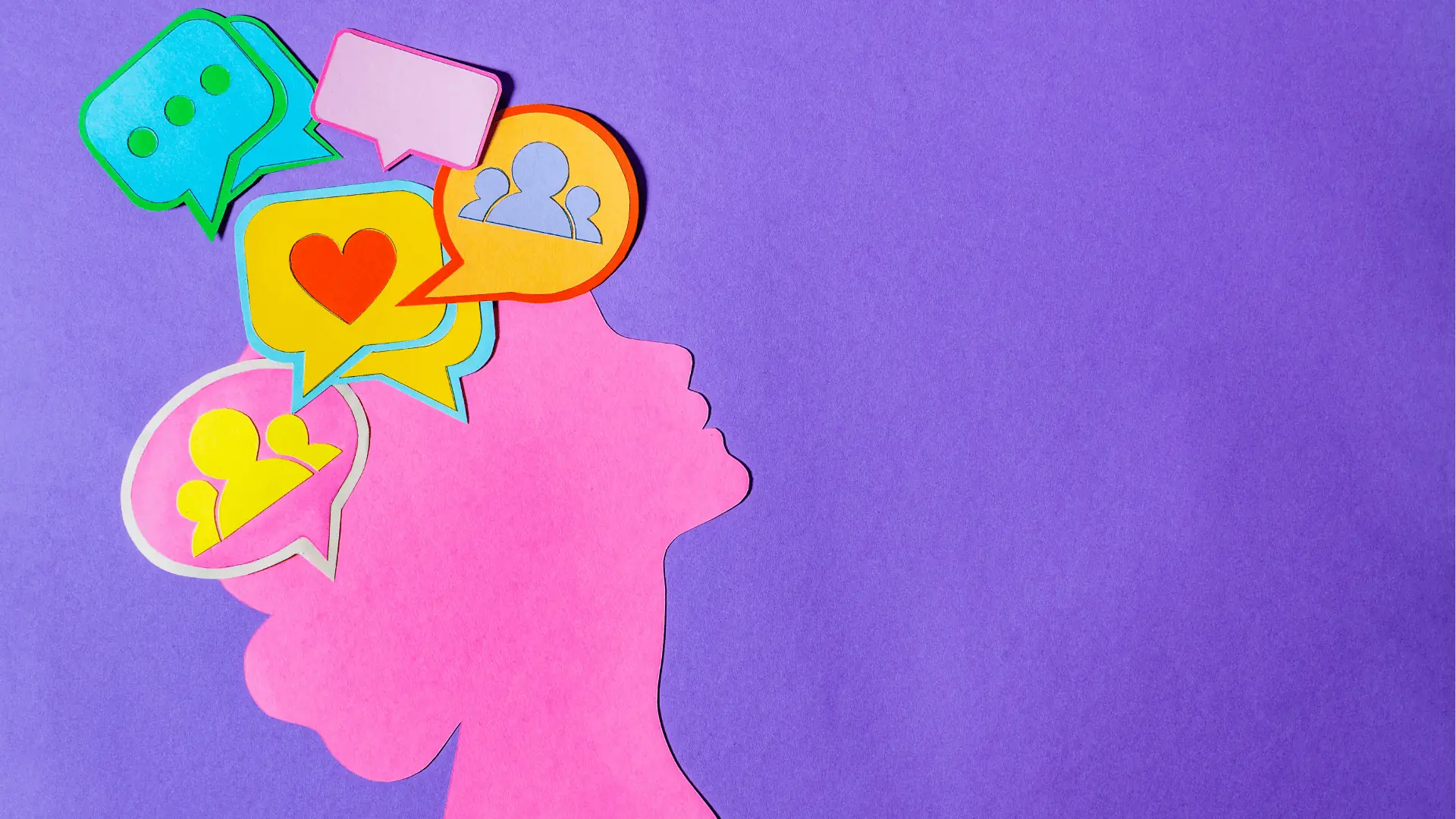 Paper-cut pink profile silhouette with colorful speech bubbles and social icons for workflow